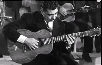 Joseph_Reinhardt,_guitarist_(still_from_P._Paviot_film__Django_Reinhardt_,_1957).jpg